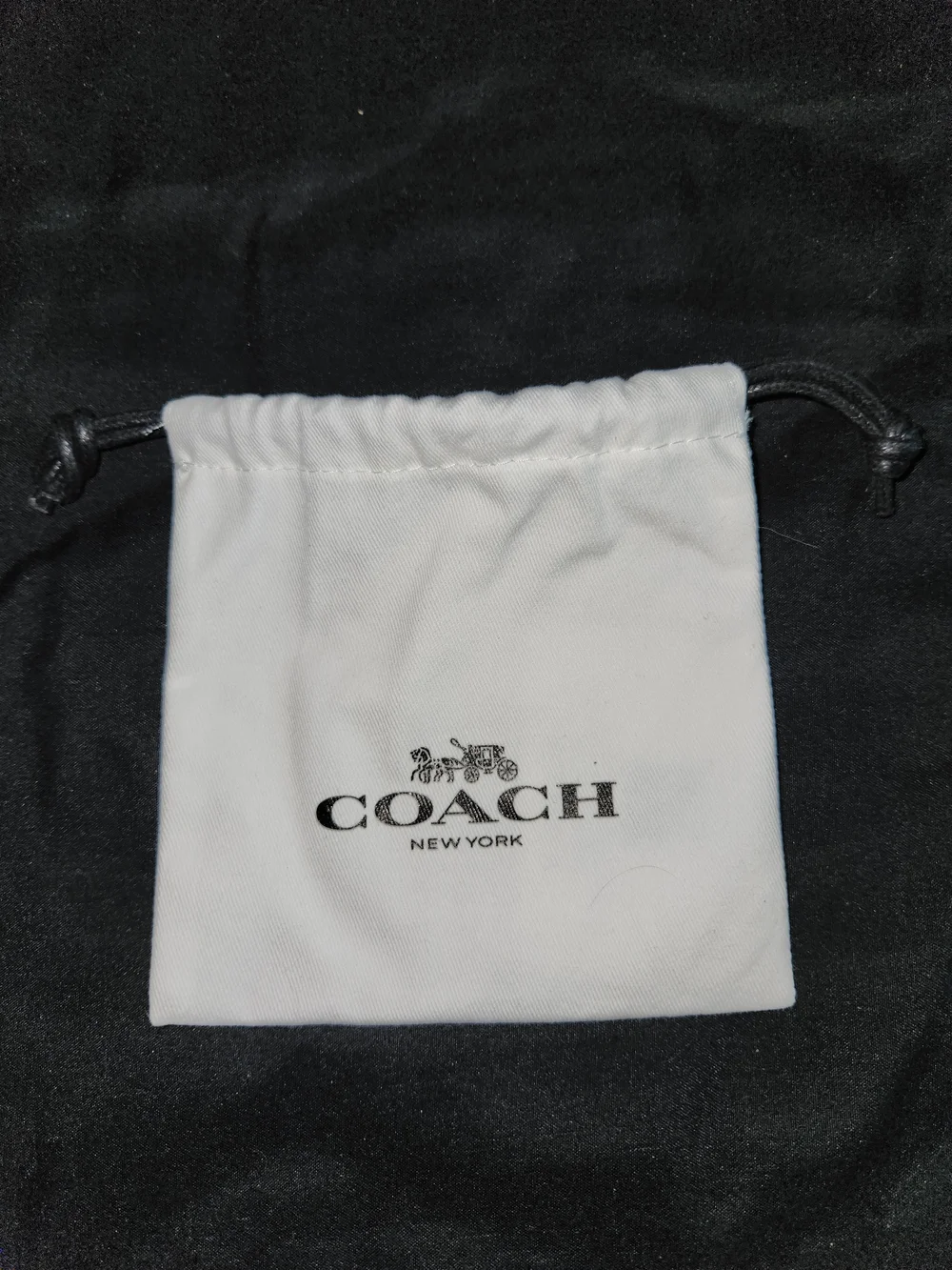 Coach White Logo Drawstring Pouch